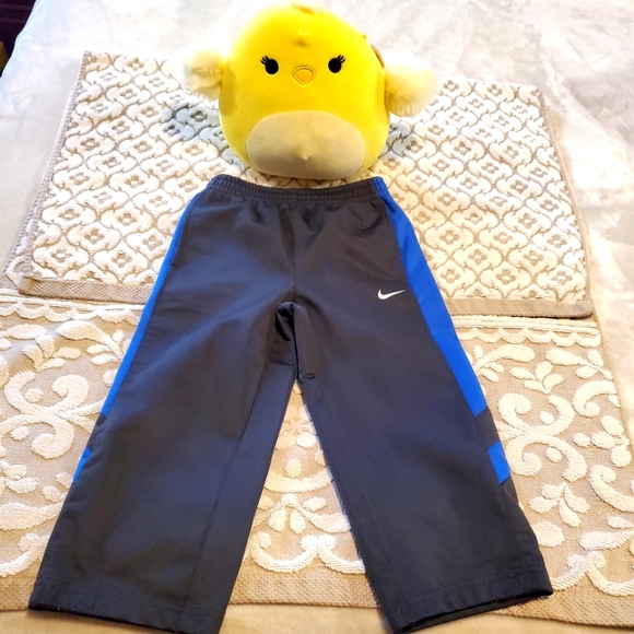 ⬇️ Nike fleece lined track pants - Picture 1 of 8